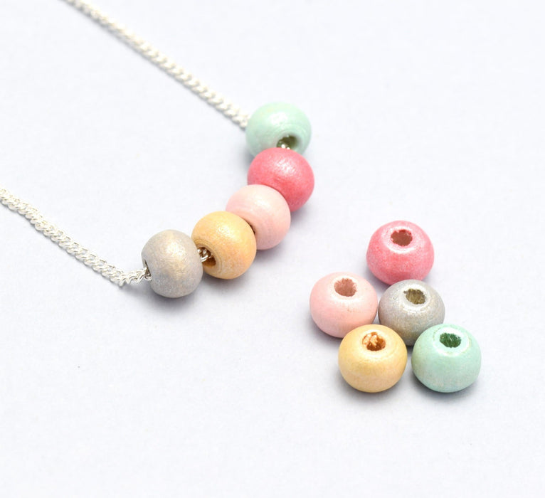 Vente en gros lot de 5 perles 5x6mm, Trou: 2~3 mm en bois rondes couleur pastel irisée pour bijoux