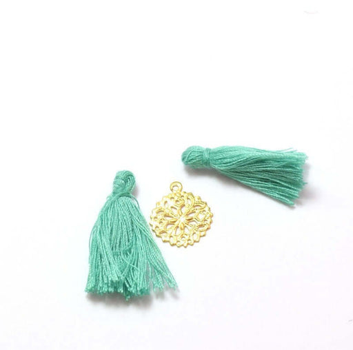 Acheter au détail 2 pompons vert amande VIF 2,5 -3 cm pour bijoux, couture ou déco