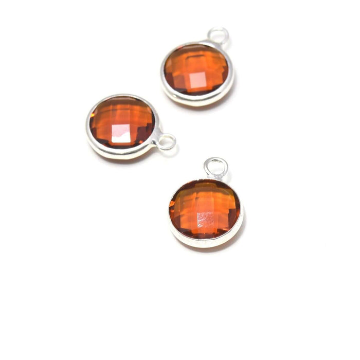 Vente 1 pendentif argent 14x11x5 mm, Trou: 2 mm et verre à facettes ambre foncé avec contours argentés